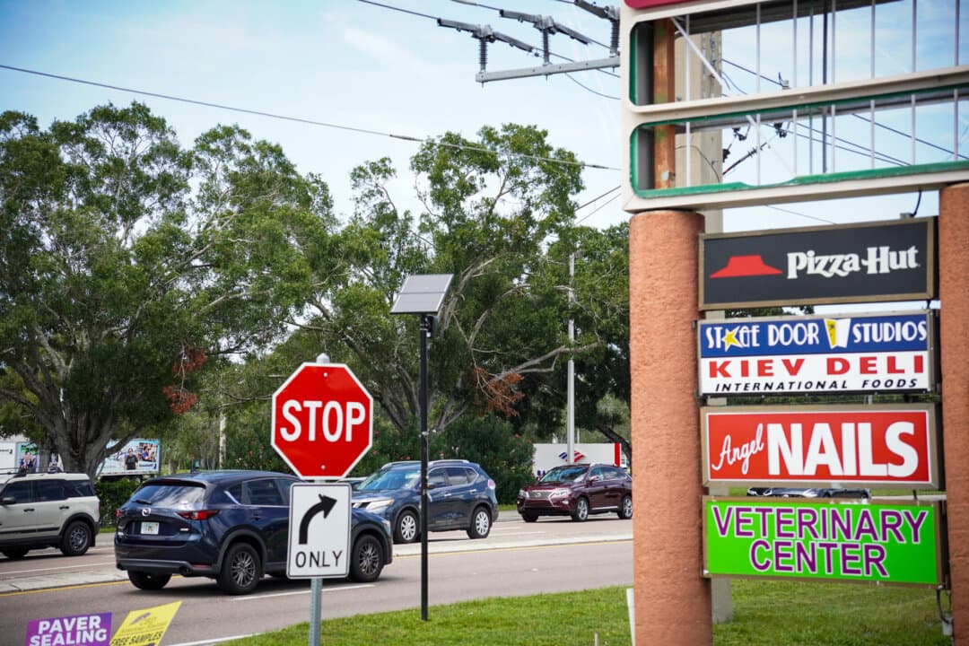 A Flock Safety camera installed along Cattleman Road in Sarasota, Fla., on Aug. 21, 2026. A former Sarasota police officer is facing criminal charges for allegedly searching for the same license plate hundreds of times using Flock Safety technology. (Jacob Burg/The Epoch Times)
