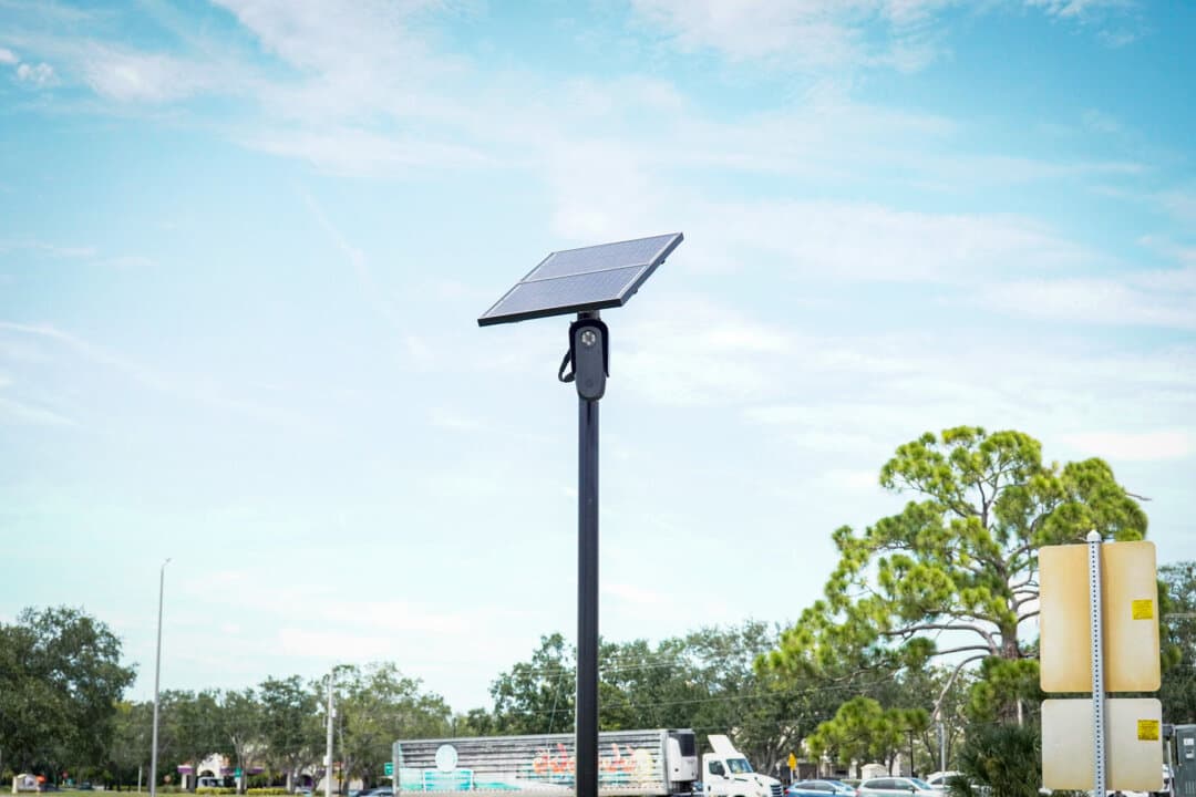 (Left) A Flock Safety camera along Cattleman Road in Sarasota, Fla., on Aug. 21, 2026. (Right) A Flock Safety camera at the entrance of a residential neighborhood near Bee Ridge Road in Sarasota, Fla., on Aug. 21, 2026. (Jacob Burg/The Epoch Times)