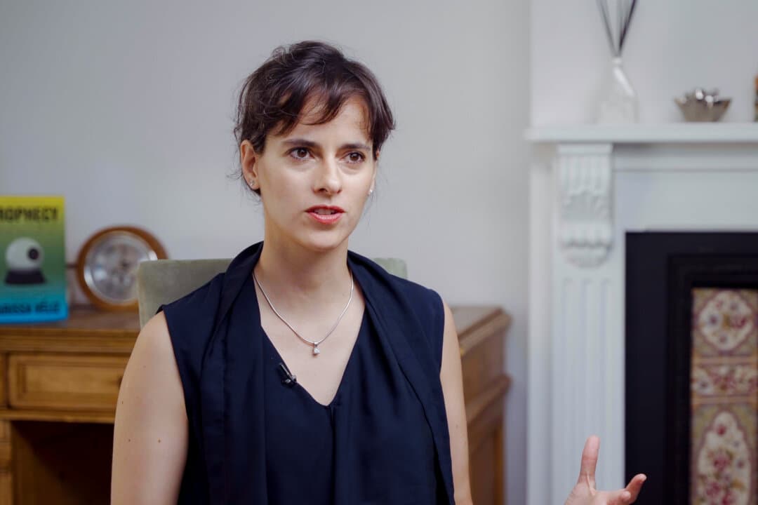 Carissa Véliz, professor of philosophy at Oxford University, speaks with "American Thought Leaders" host Jan Jekielek in Oxford, England, on June 26, 2026. (The Epoch Times)