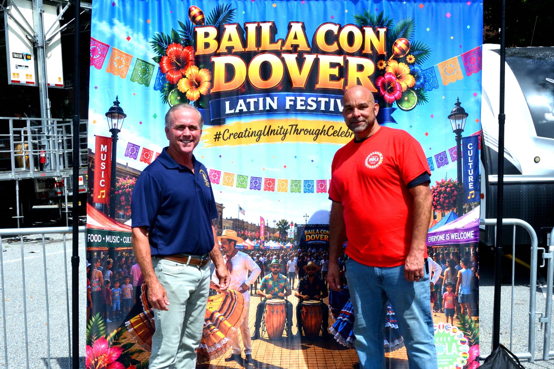 Delaware State Sen. Eric Buckson (L) and the event organizer Tony Velazquez at the fourth annual Baila Con Dover Latin Festival on Aug. 29, 2026. (Frank Liang/The Epoch Times)