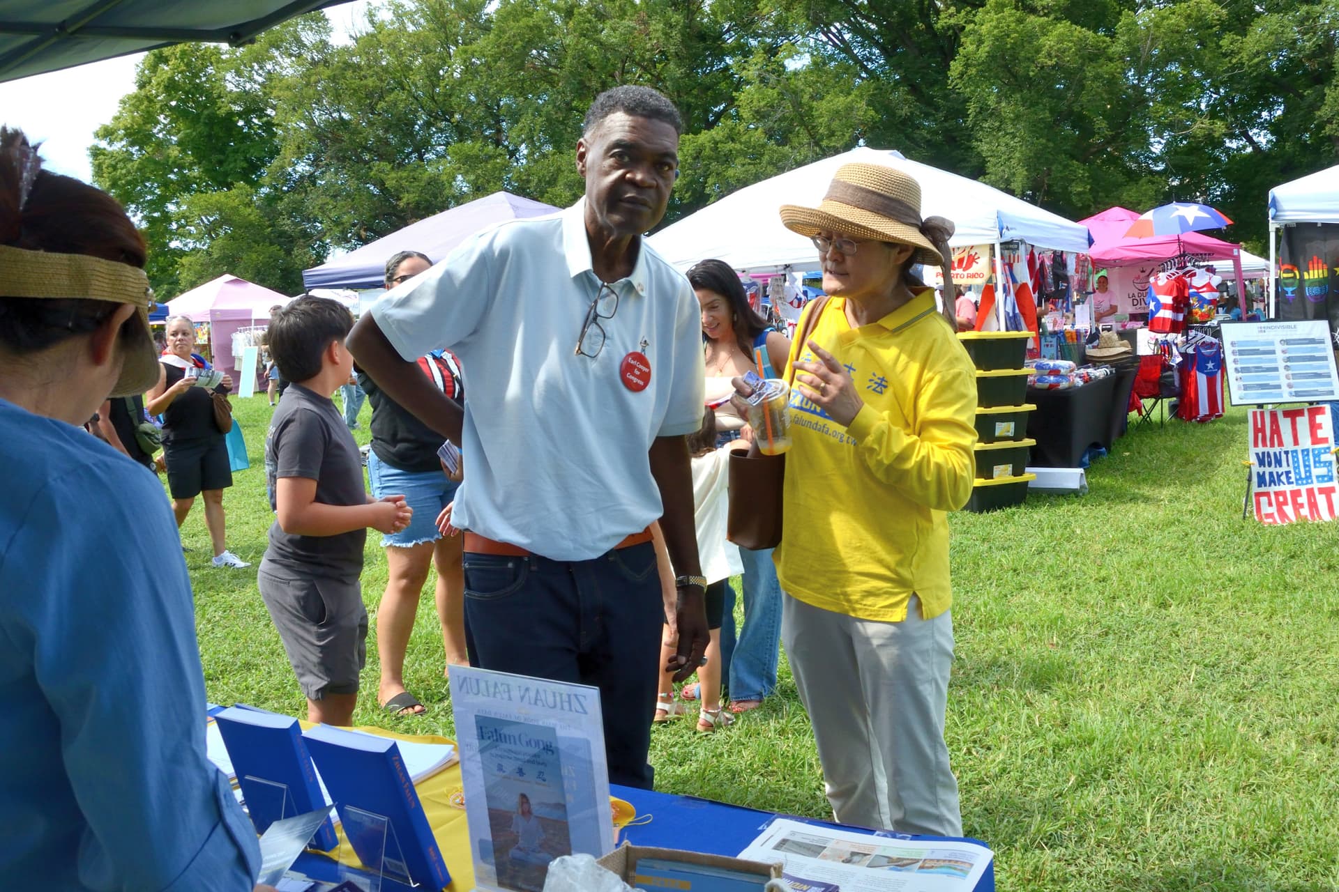 Earl Cooper (L), a Republican candidate for Delaware's at-large U.S. House seat, at the 4th annual Baila Con Dover Latin Festival on Aug. 29, 2026. (Frank Liang/The Epoch Times)