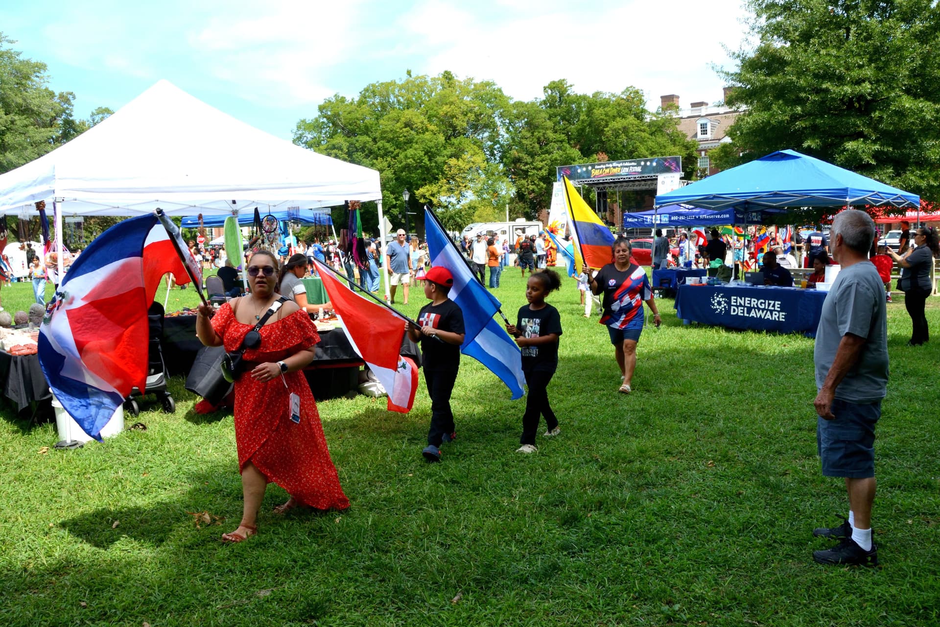 The fourth annual Baila Con Dover Latin Festival is held at the Green in historic downtown Dover, Del., on Aug. 29, 2026. (Frank Liang/The Epoch Times)