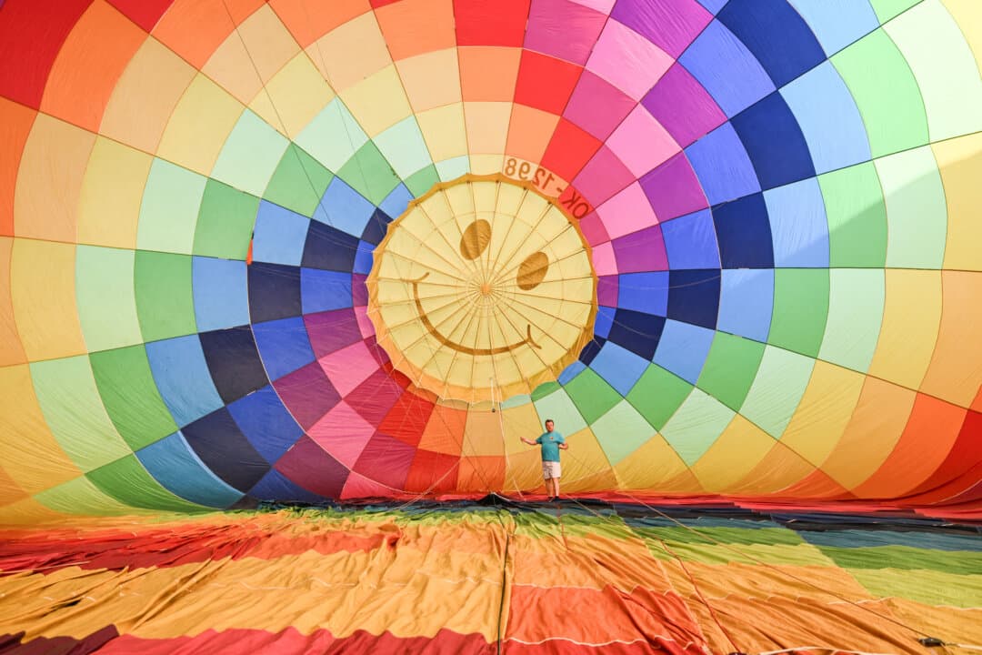 A man prepares a hot-air balloon before the Hot Air Balloon Fiesta, in Hradec Kralove, Czech Republic, on Sept. 2, 2026. (Michal Cizek/AFP via Getty Images)