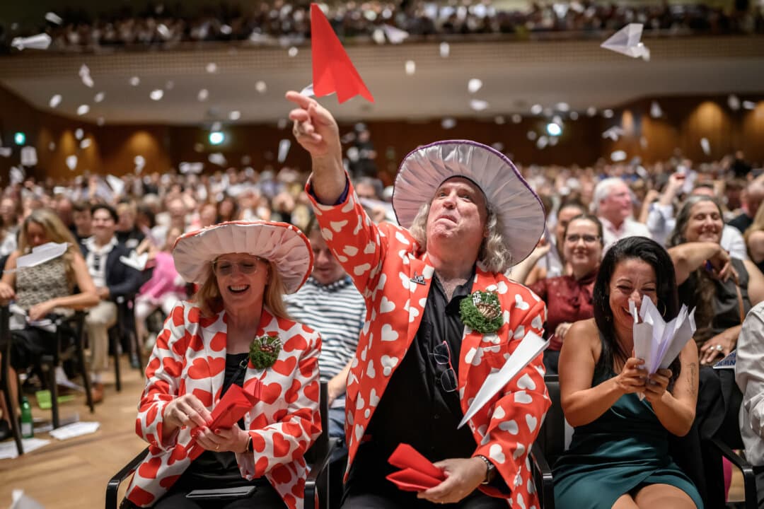 Audience members toss paper airplanes during the 2026 Ig Nobel Prize Ceremony, following a long-standing tradition, in Zurich, Switzerland, on Sept. 3, 2026. The Ig Nobel Prize is a parody of the Nobel Prize, honoring unusual or trivial achievements in scientific research. (Fabrice Coffrini/AFP via Getty Images)