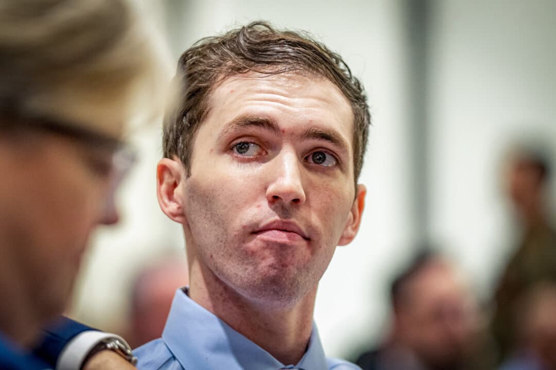 Tyler Robinson, accused of fatally shooting Charlie Kirk, appears during a hearing at the Fourth District Court in Provo, Utah, on Dec. 11, 2025. Prosecutors charged Robinson with aggravated murder and plan to seek the death penalty. (Rick Egan-Pool/Getty Images)