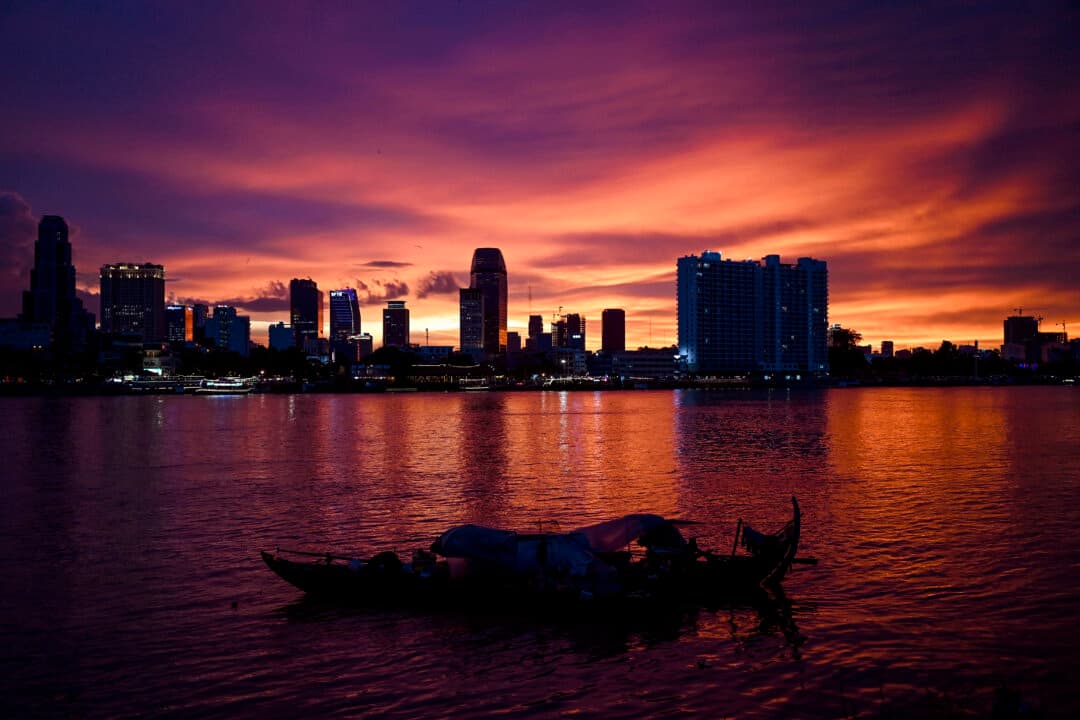 A fishing boat on the Tonle Sap River during sunset in Phnom Penh, Cambodia, on Sept. 7, 2026. (Tang Chhin Sothy/AFP via Getty Images)