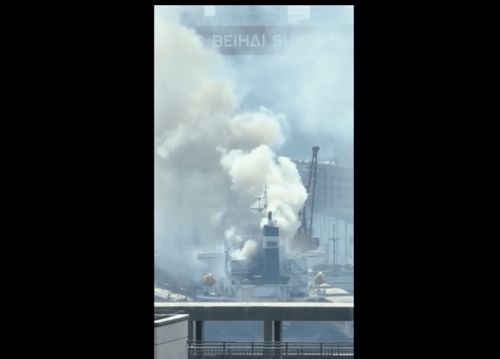 Thick smoke rises from a cargo ship in Qingdao, Shandong Province, China, on Sept. 10, 2026. (Social media via Reuters/Screenshot via The Epoch Times)