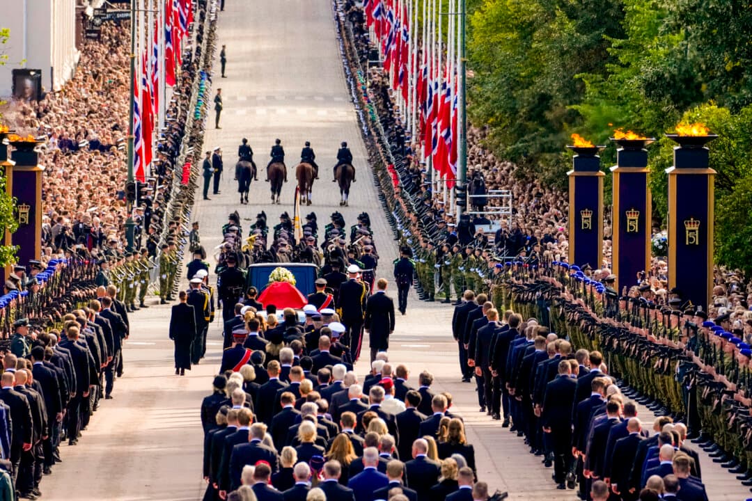 The casket of late King Harald V of Norway is followed by royal representatives and heads of state as it moves in a royal procession along Karl Johans gate to the Cathedral in Oslo on Sept. 9, 2026. (Ole Berg-Rusten/NTB/AFP via Getty Images)/Norway OUT