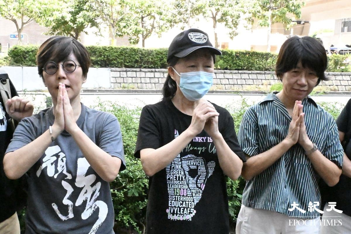 Chow Hang-tung's mother, Medina Chow (C), and Lee Cheuk-yan's wife, Elizabeth Tang (L), speak to reporters outside West Kowloon Law Courts Building in Hong Kong on Sept. 11, 2026. (Wu Ruilue/The Epoch Times)