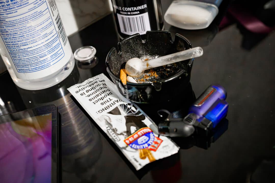 (Top) A table-top game in a raided casino in Los Angeles County on Aug. 20, 2026. (Bottom Left) A meth pipe left behind after a raid on Aug. 20, 2026. (Bottom Right) Cash and ammunition cartridges are left after a raid on Aug. 20, 2026. (Michael Ares for The Epoch Times)