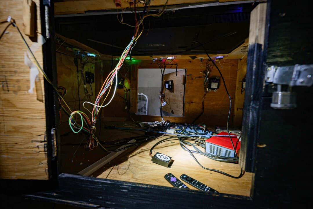 (Top Left) A sheriff's deputy watches as suspects are lined up against a wall after a raid on an underground casino in Los Angeles County on Aug. 20, 2026. (Top Right) Suspects are detained and lined up against a wall. (Bottom Left) The aftermath of the raid on an underground casino on Aug. 20, 2026. (Bottom Right) Wiring, remote controls, and other components of an illegal gambling machine taken during the raid. (Michael Ares for The Epoch Times)