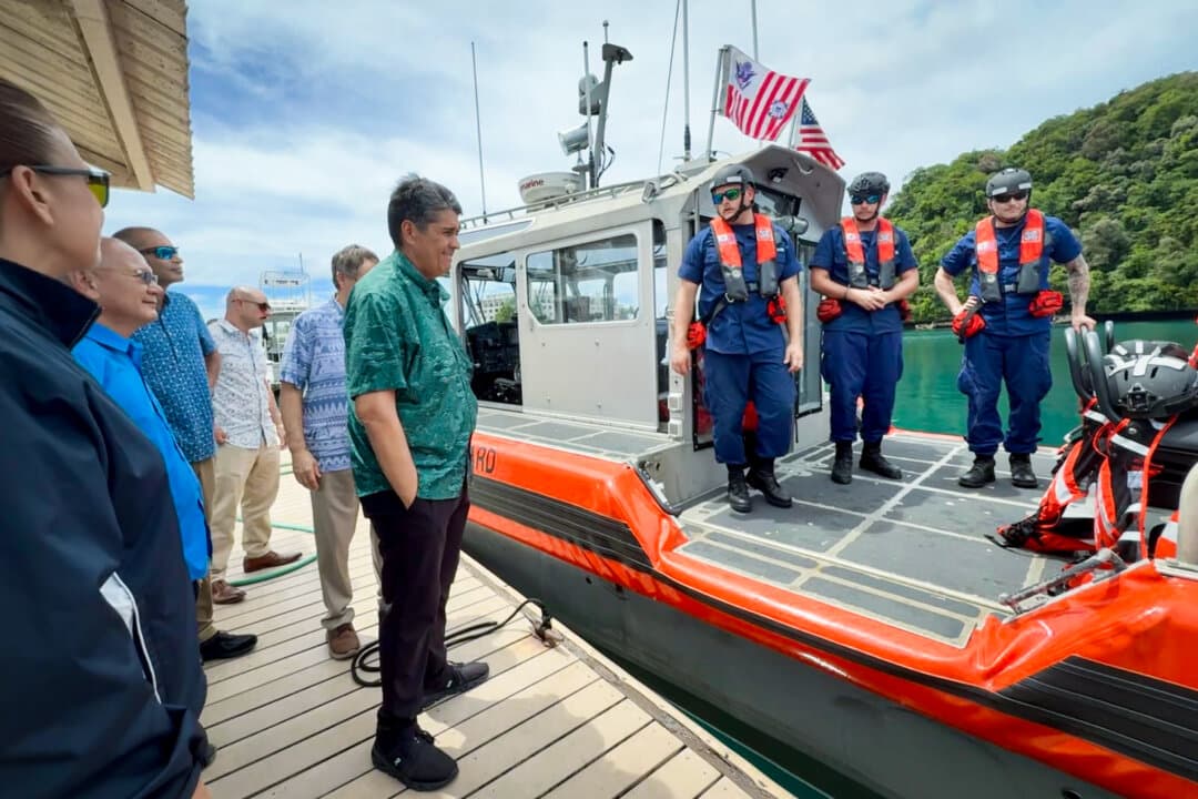 Palauan President Surangel Whipps Jr. speaks with the crew of a U.S. Coast Guard cutter in Malakal Bay, Palau, on June 26, 2025. Whipps has welcomed a U.S. Coast Guard presence as a deterrent to drugs and other illegal activities. (Petty Officer 3rd Class Austin Wiley/U.S. Coast Guard)