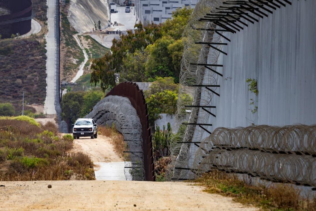 (Left) Border Patrol agents drive along the southern border outside of San Diego on May 27, 2026. (Right) A Border Patrol agent enters through the U.S. border wall outside of San Diego on Jan. 20, 2026. (John Fredricks/The Epoch Times)
