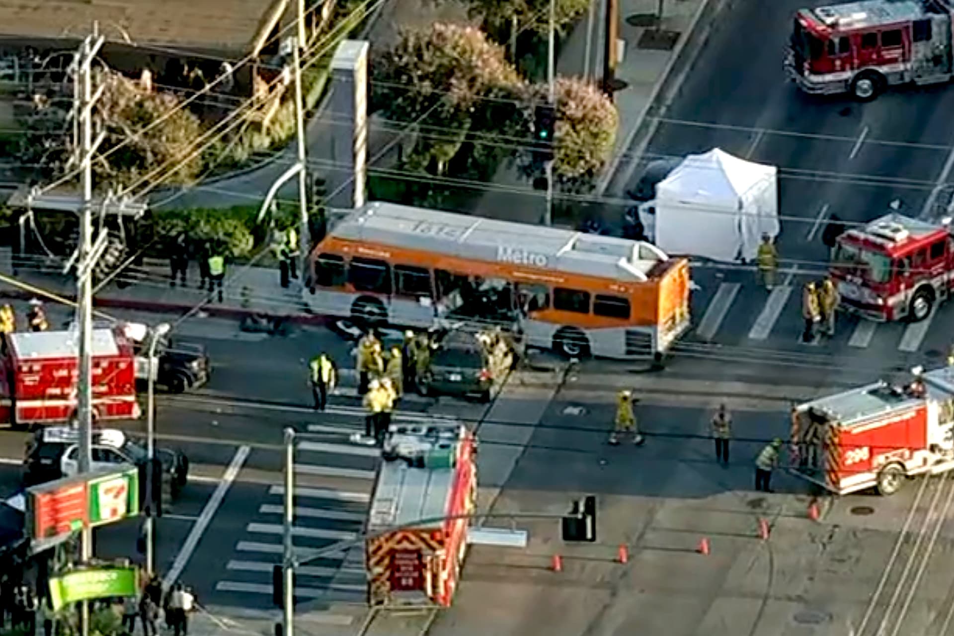 Firefighters respond to a deadly bus crash, in Los Angeles on Sept. 15, 2026, in a still from video. (KABC-TV via AP)