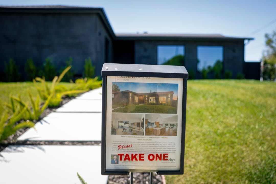Real estate flyers are displayed outside a home for sale in Los Angeles on Aug. 16, 2024. (Patrick T. Fallon/AFP via Getty Images)