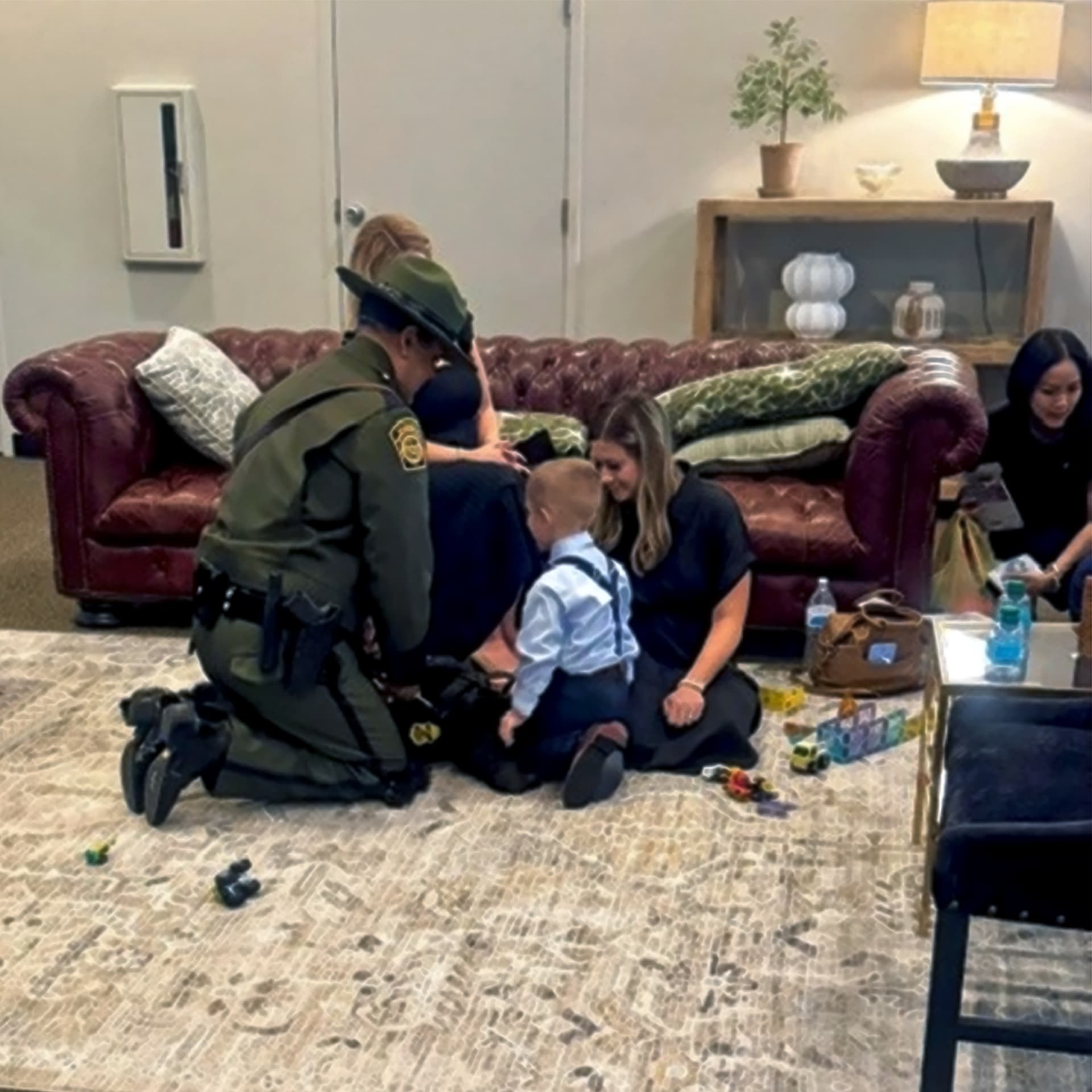 Chloe and a Border Patrol agent support the family at the funeral for Deputy U.S. Marshal Drew Hanson on July 18, 2026. Hanson was shot and killed in the line of duty on July 13. (Courtesy of CBP)