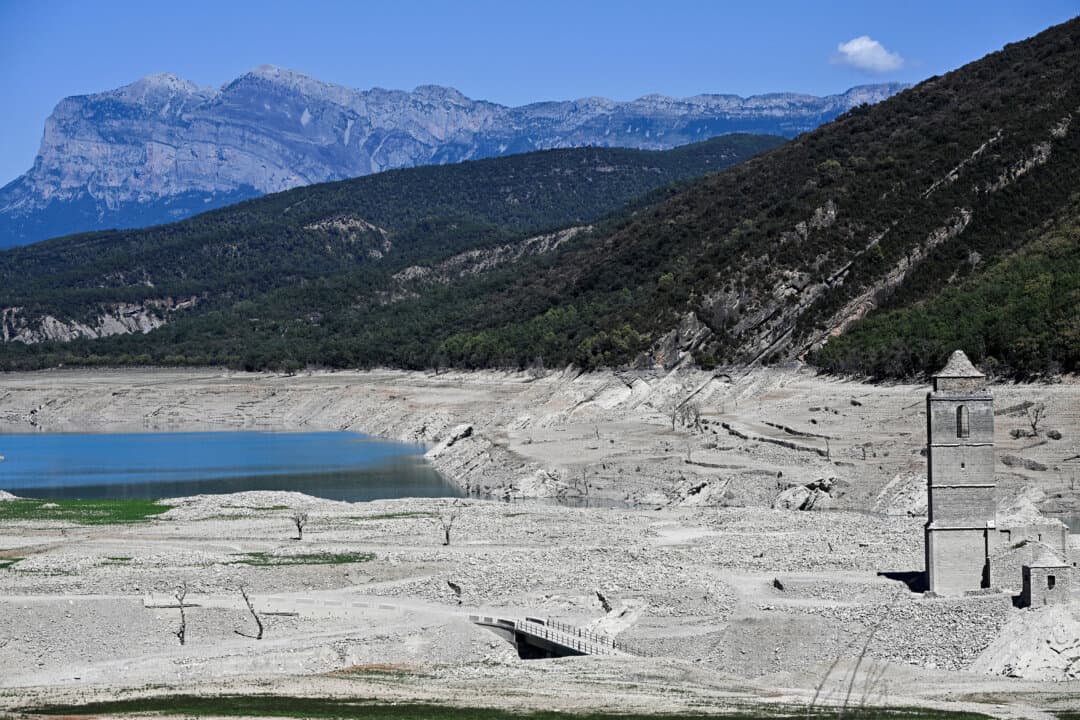 A view of the Mediano reservoir, with the Church of Asuncion fully visible, in Mediano, Spain, on Sept. 15, 2026. The photograph is part of a long-term project documenting sites affected by drought. (Ander Gillenea/AFP via Getty Images)