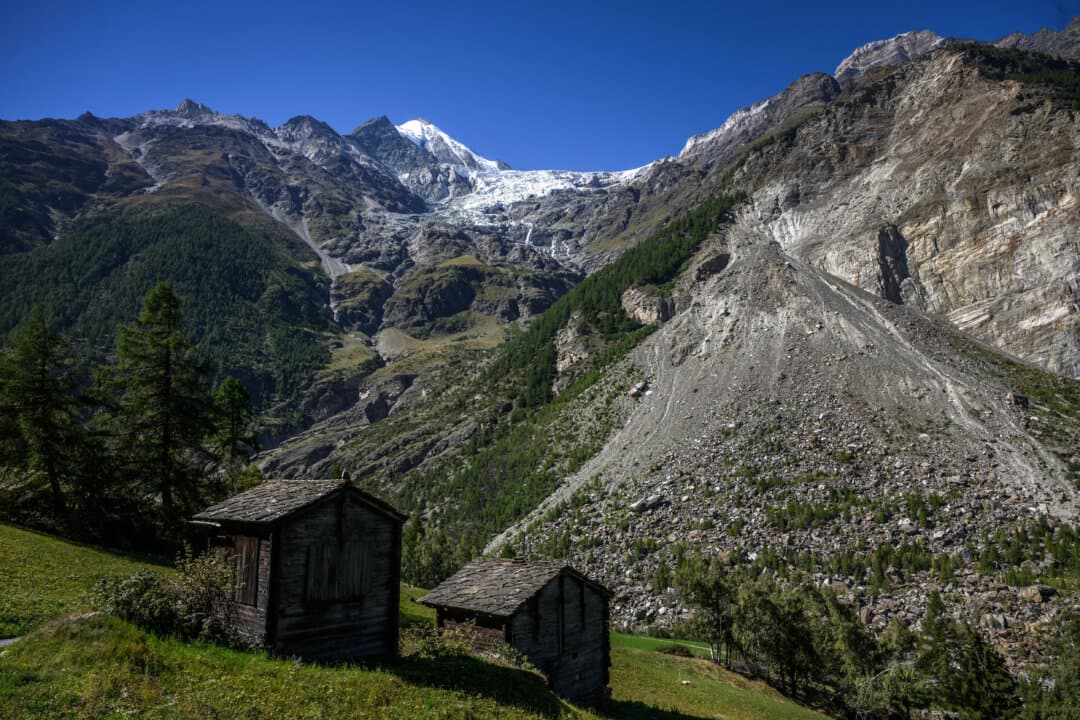 The Weisshorn's eastern glacier is seen above Randa, Switzerland, on Sept. 15, 2026. Local authorities have raised the alert level following multiple ice break-offs and restricted access to the designated hazard zone. (Fabrice Coffrini/AFP via Getty Images)