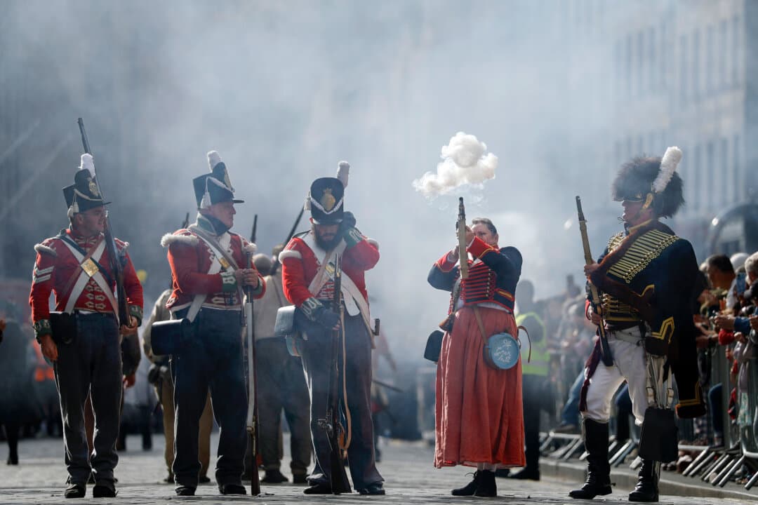 Members of the History Matters reenactment team fire muskets during the Edinburgh Riding of the Marches in Edinburgh, Scotland, on Sept. 13, 2026. (Jeff J Mitchell/Getty Images)