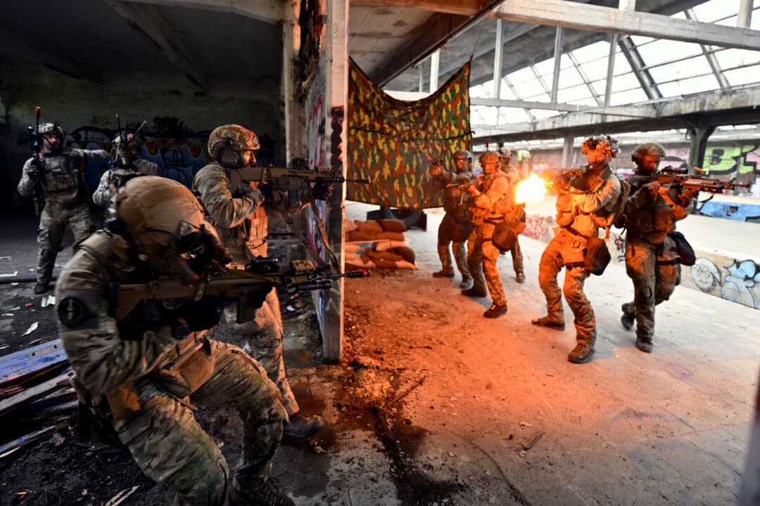 Soldiers take part in the Rupt'Hure joint military exercise involving French and Belgian troops, in Plombieres, Belgium, on Sept. 17, 2026. (Eric Lalmand/Belga/AFP via Getty Images)