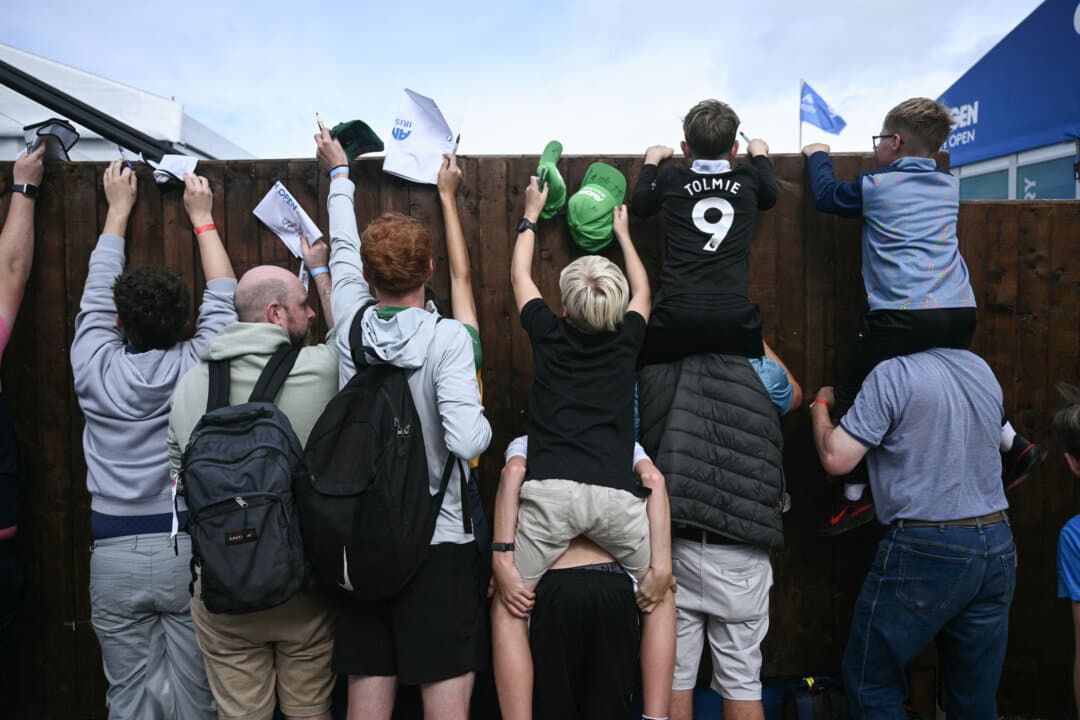 Autograph seekers wait for golfers after the final round of the Irish Open at Trump International Golf Links and Hotel, during a visit by President Donald Trump in Doonbeg, Ireland, on Sept. 13, 2026. (Brendan Smialowski/AFP via Getty Images)