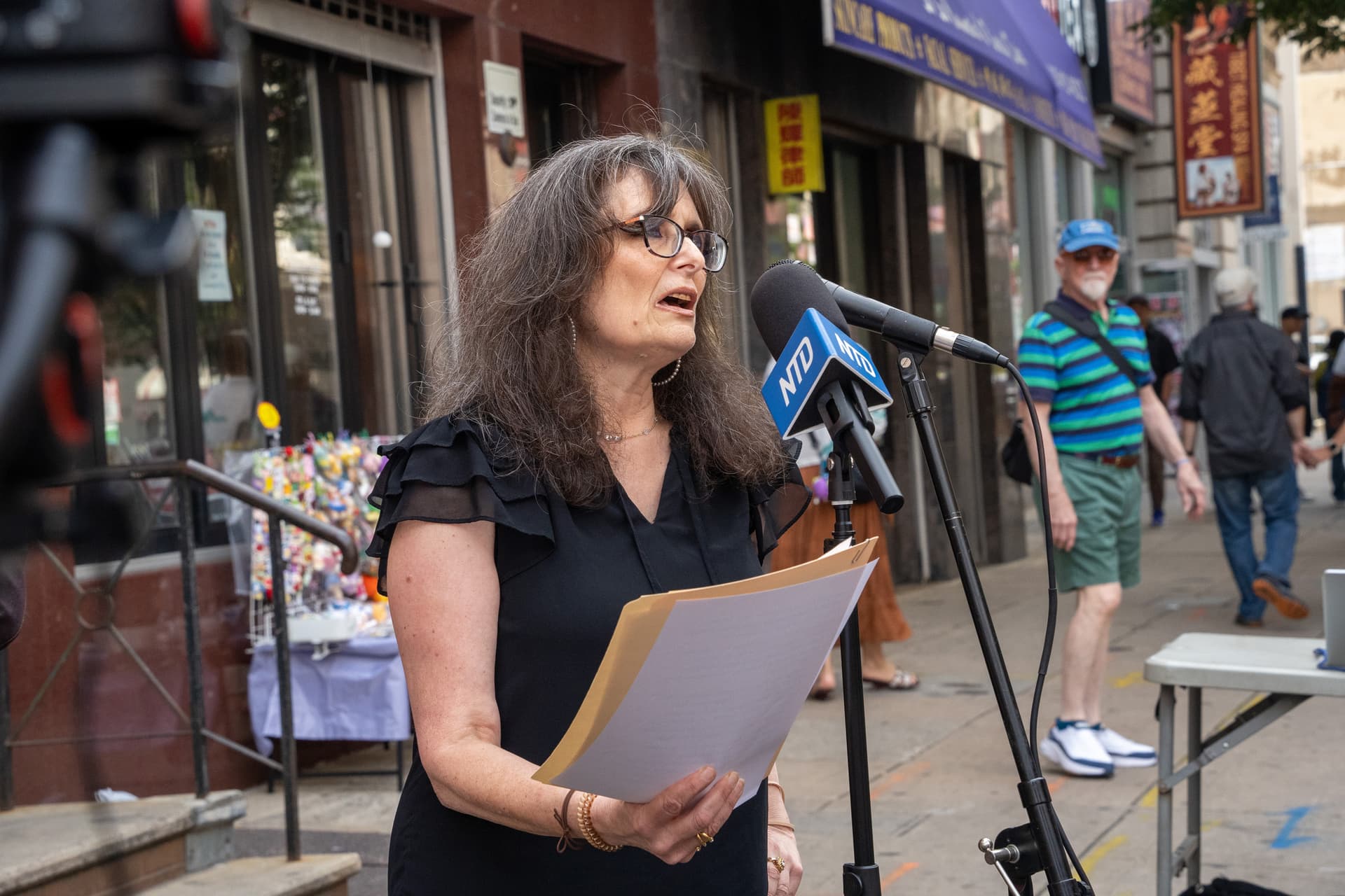 Christine Flowers, a Philadelphia immigration lawyer and syndicated columnist, speaks at a rally in Philadelphia on Sept. 19, 2026. (Serena Shi/The Epoch Times)