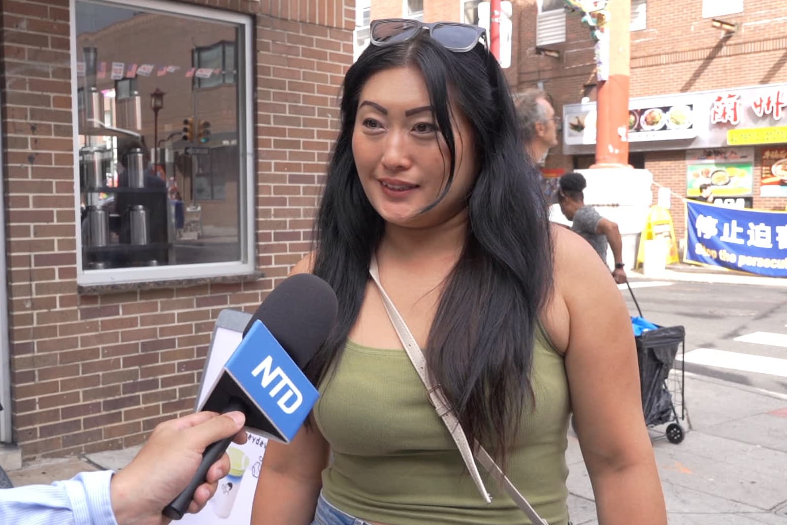 Nancy Lee, a sales associate at Bloomingdale's in King of Prussia Mall in Philadelphia’s Chinatown on Sept. 19, 2026. (Steve Wen/The Epoch Times)