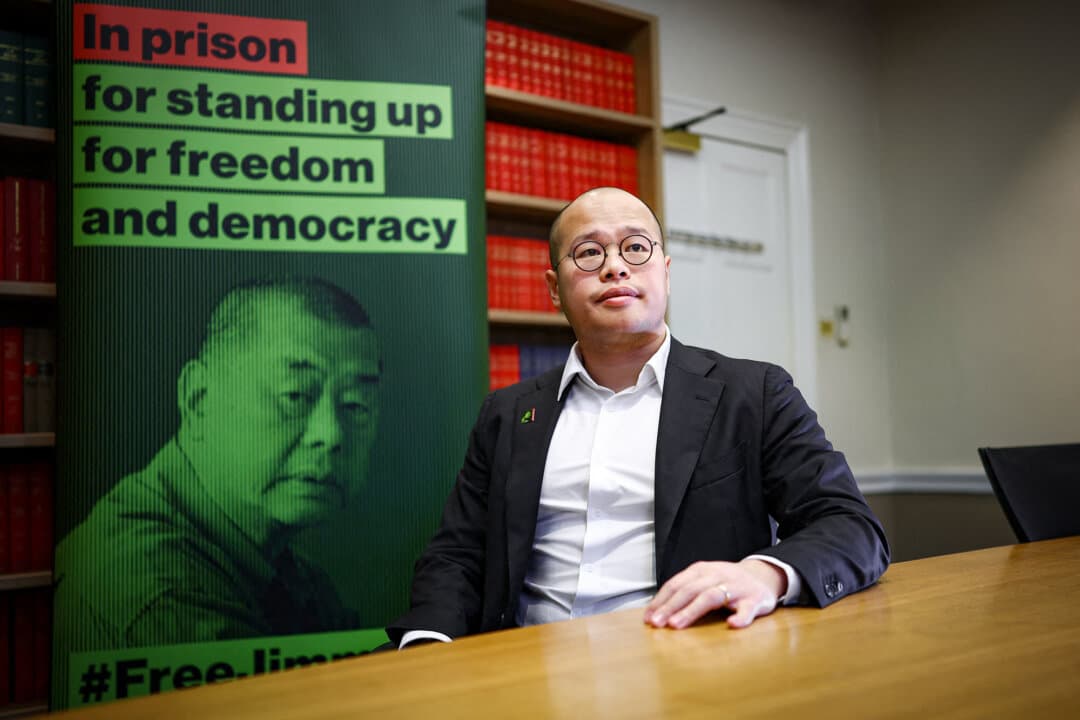 Sebastien Lai Sung-yan, son of jailed Hong Kong media mogul Jimmy Lai, poses for a photo following a news conference in London on Dec. 15, 2025. (Henry Nicholls/AFP via Getty Images)
