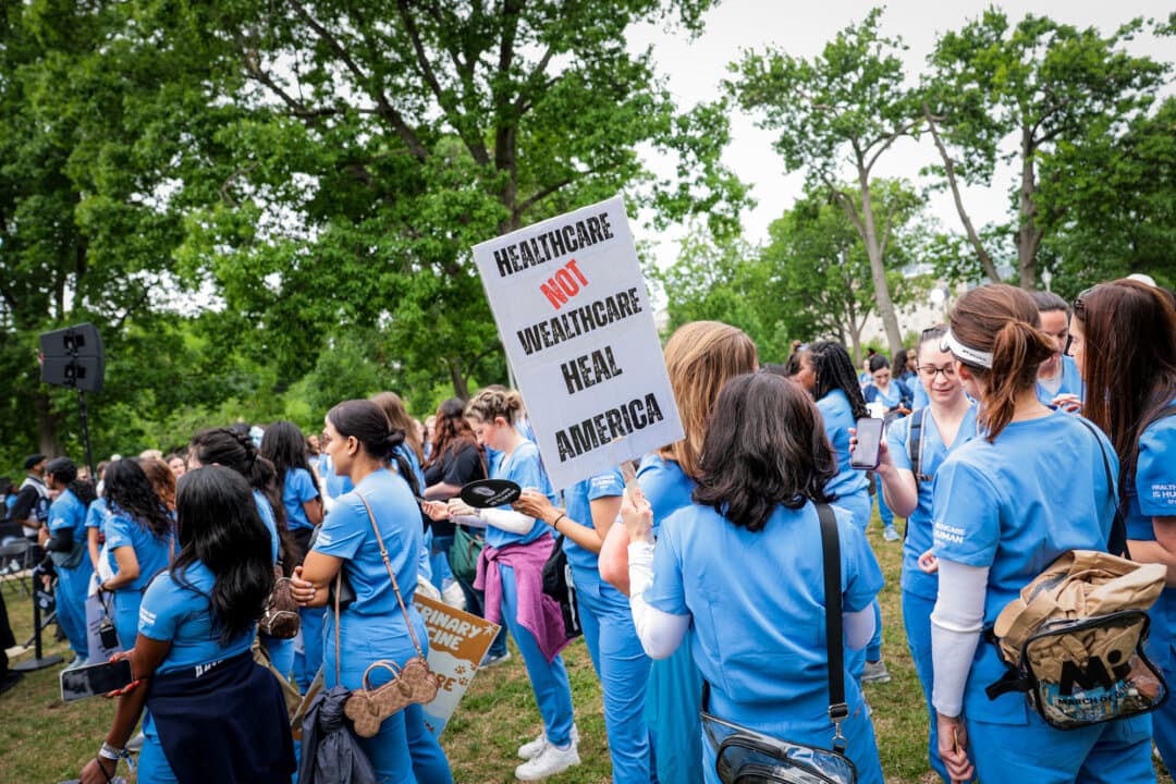 Health care professionals and medical students attend the “Healthcare is Human” rally outside the U.S. Capitol in Washington on May 21, 2026. The rally advocated for legislation to relieve short staffing, combat burnout and protect whistleblowers. (Anna Moneymaker/Getty Images)