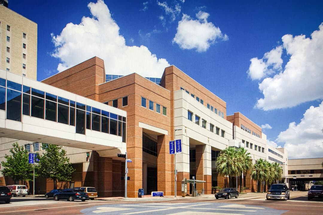 St. Joseph Medical Center in Houston, on July 23, 2018. The hospital was acquired by Steward Healthcare—which was owned by a private equity firm—in 2017. Steward went bankrupt in 2024; the collapse became a national example of private equity and real-estate deals draining a hospital chain. (St. Joseph Medical Center/CC BY-SA 4.0)