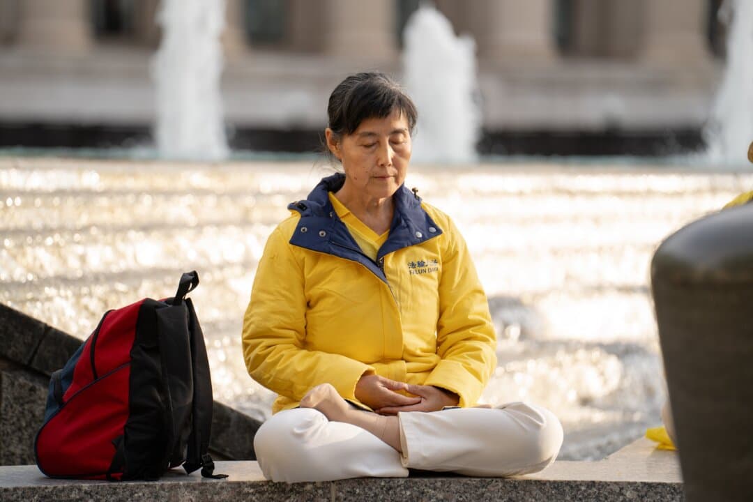 Falun Gong practitioners perform the exercises during events to demand an end to the Chinese Communist Party's persecution of the spiritual practice, during Chinese leader Xi Jinping's state visit to Washington on Sept. 24, 2026. (Samira Bouaou/The Epoch Times)
