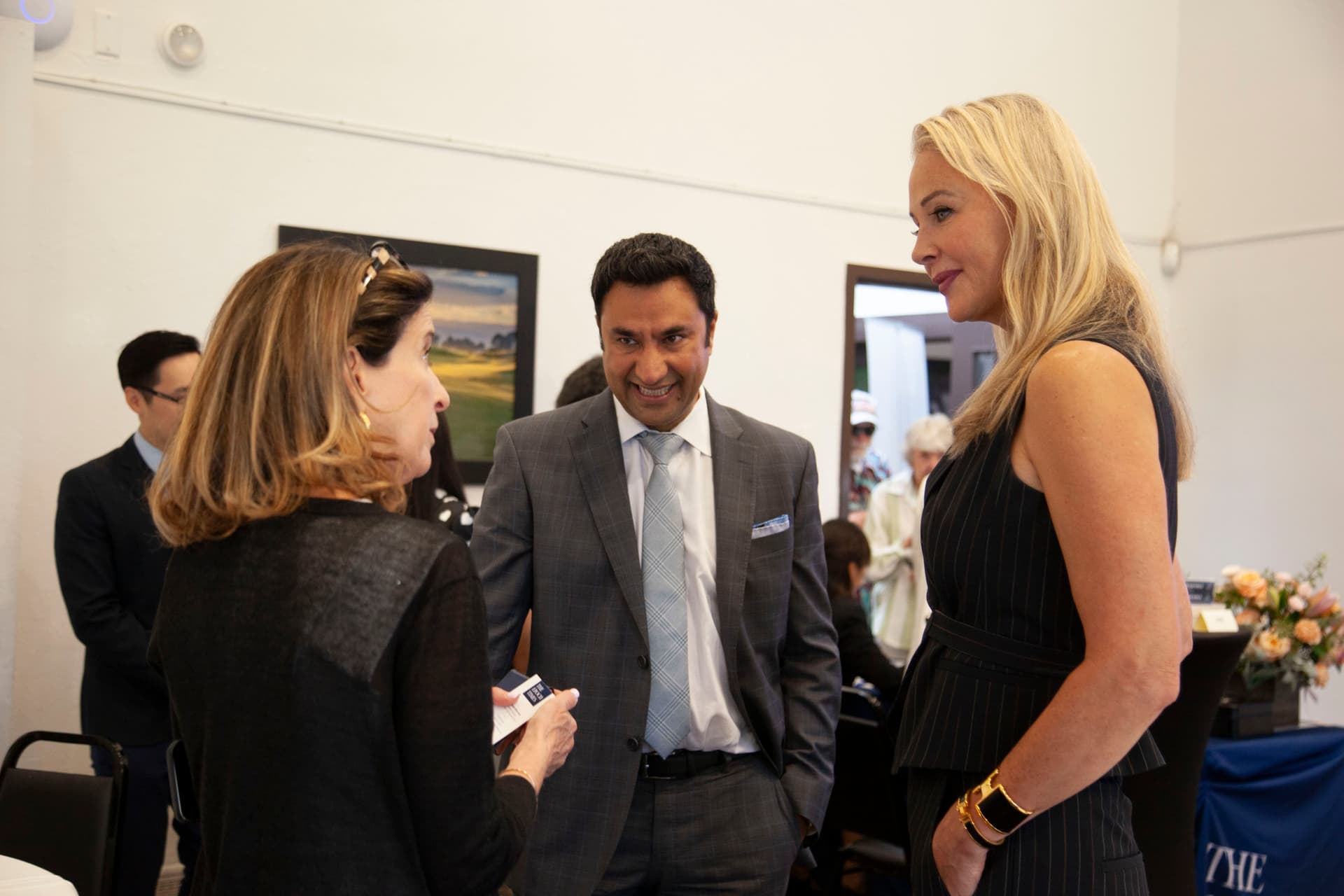 Free Now Foundation President Alix Mayer (R) chats with California Insider host Siyamak Khorrami (C) and a guest. (Lear Zhou/The Epoch Times)