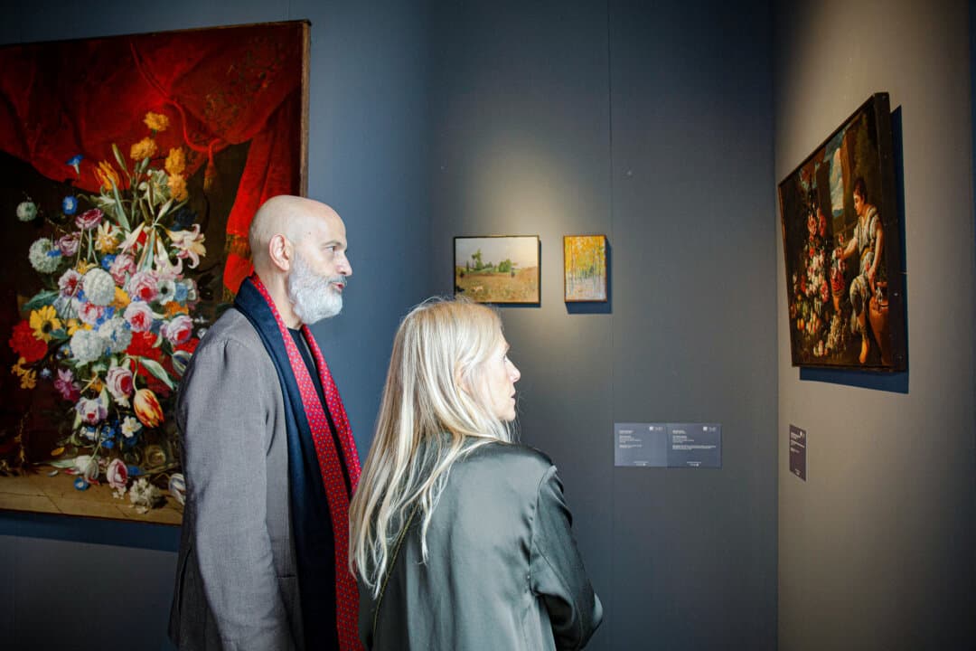 (Clockwise from Top Left) Paintings are displayed during the 33rd International Biennial of Antiques in Florence, Italy, in September 2024; a visitor studies a painting displayed during the 33rd International Biennial of Antiques in Florence, Italy, in 2024; visitors look at paintings displayed during the 33rd International Biennial of Antiques in Florence, Italy, in 2024; detail of antique artwork displayed during the 33rd International Biennial of Antiques in Florence, Italy, in 2024. (Dario Borruto, Antonello Tofani)