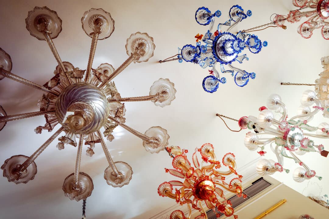 Glass chandeliers are exhibited at the Archimede Seguso glass-making factory on the island of Murano in Venice, Italy, on Aug. 29, 2010. Murano has been the center of Italian glassmaking since the 1200s. In the 18th century, glassmaker Giuseppe Briati used the techniques of Bohemian glassmakers to pioneer a new style that revived Venetian glassmaking and again elevated it to an elite art. (Vincenzo Pinto/AFP Photo via Getty Images)
