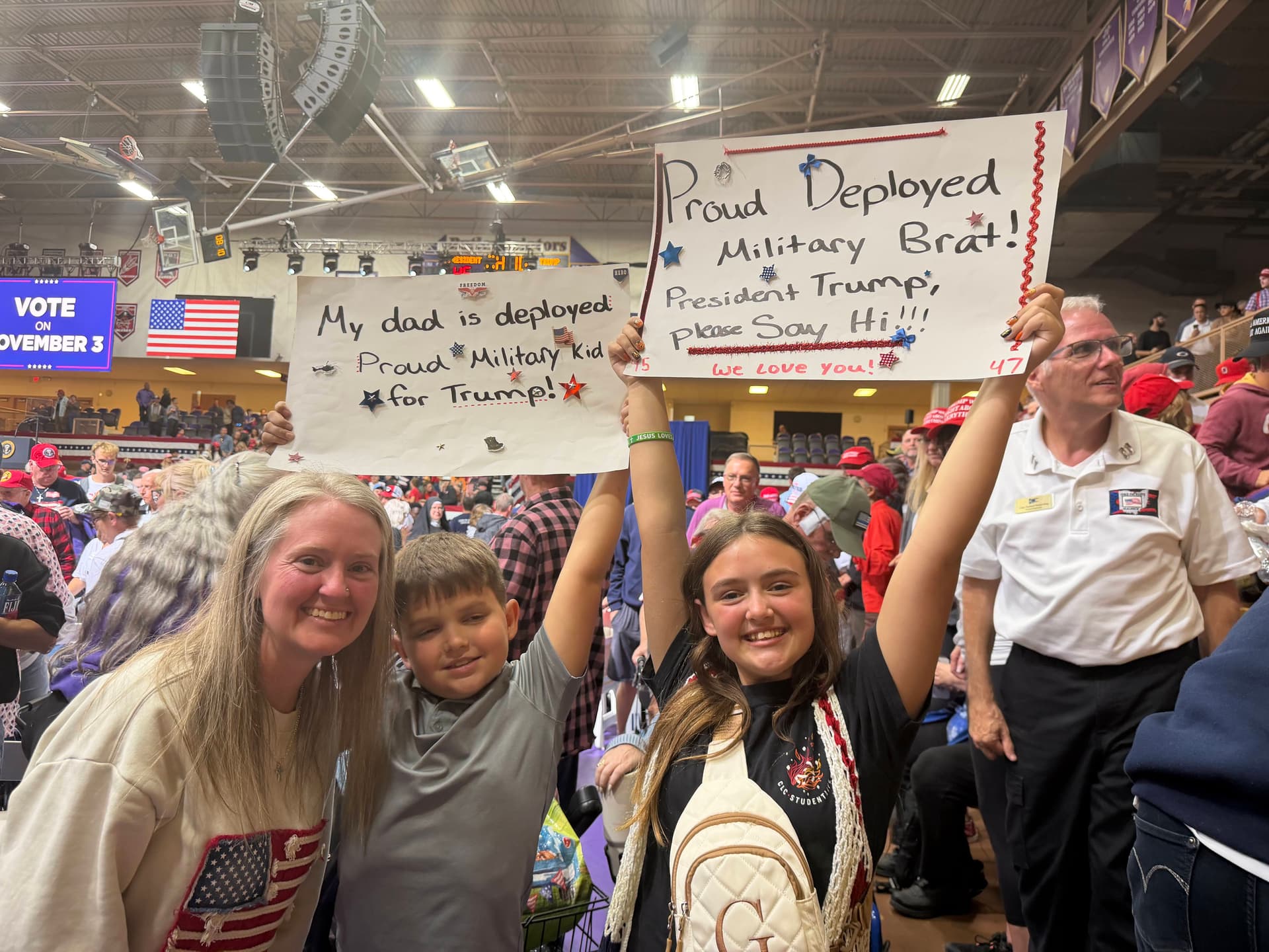 Sarah Weidman (L) poses with her children, Hunter and Grace, after President Donald Trump’s midterm election rally in Vandalia, Ohio, on Oct. 3, 2026. (Janice Hisle/The Epoch Times)