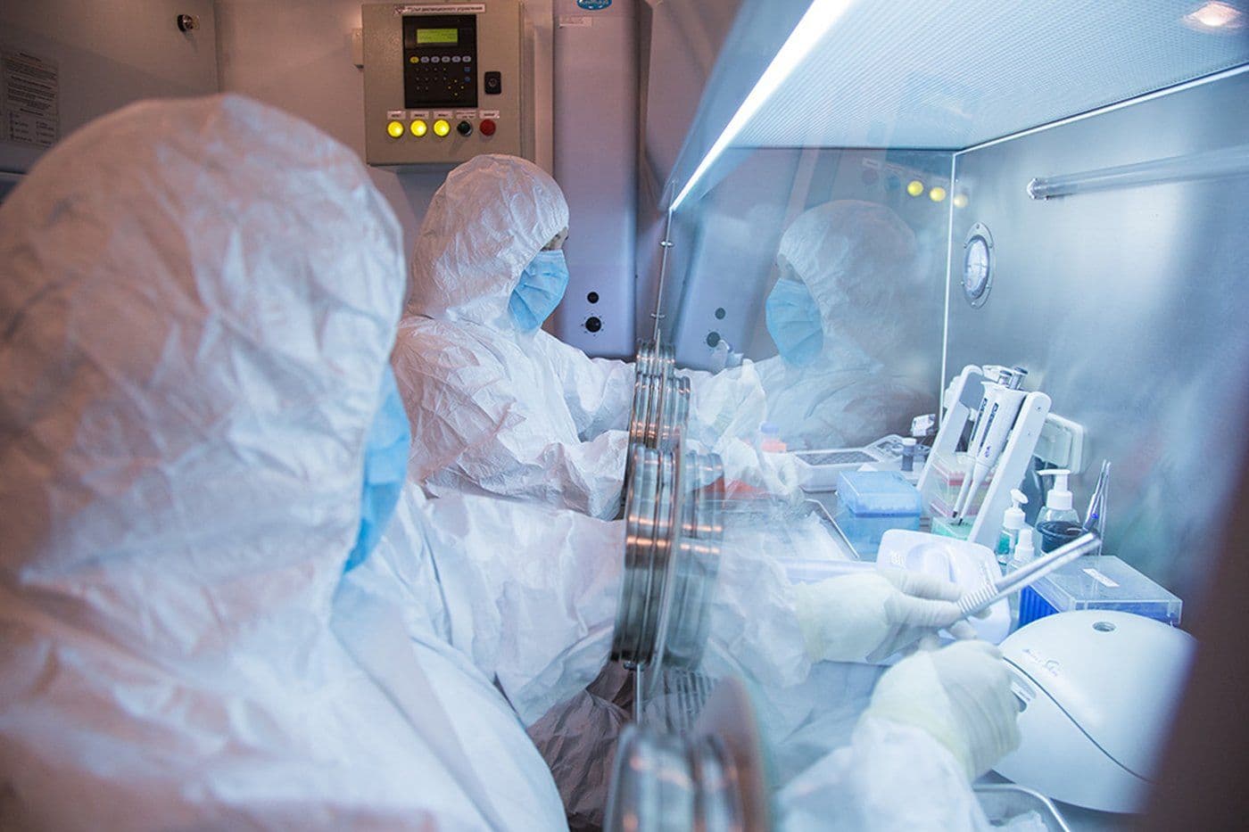 This undated photo released in 2019 by the Irkutsk Anti-Plague Research Institute of Siberia and Far East shows institute workers in a lab. (The Irkutsk Anti-Plague Research Institute of Siberia and Far East via AP)