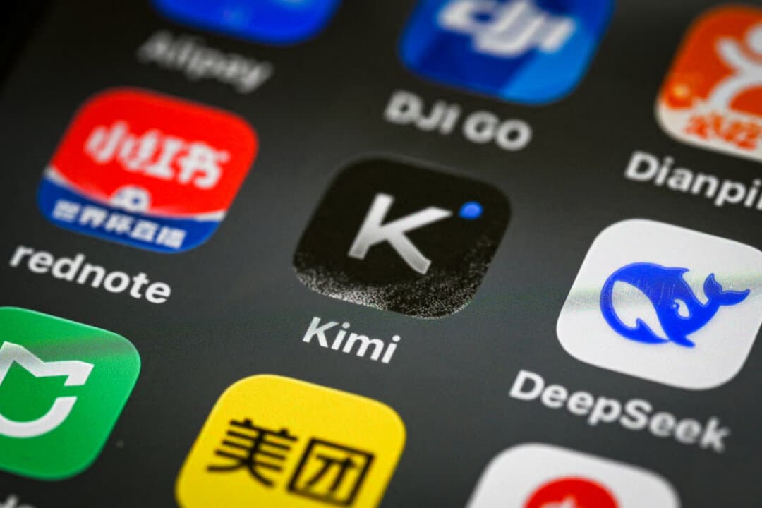 The icon for artificial intelligence start-up Moonshot's Kimi app, on a cellphone in Beijing on July 17, 2026. Because the numerical parameters of free open-weight models such as Kimi are publicly released and can be downloaded and tweaked by users, they “require a lot less infrastructure in order to actually be deployed quickly,” said America First Policy Institute's Joel Thayer. (Greg Baker/AFP via Getty Images)