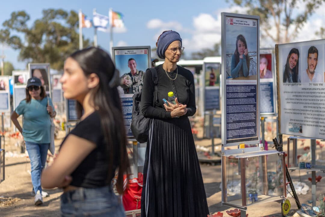 Israeli women pay their respects at the memorial to the victims of the 2023 Hamas attacks at the Nova festival site in Reim, Israel, on Oct. 6, 2026. (Ilia Yefimovich/AFP via Getty Images)