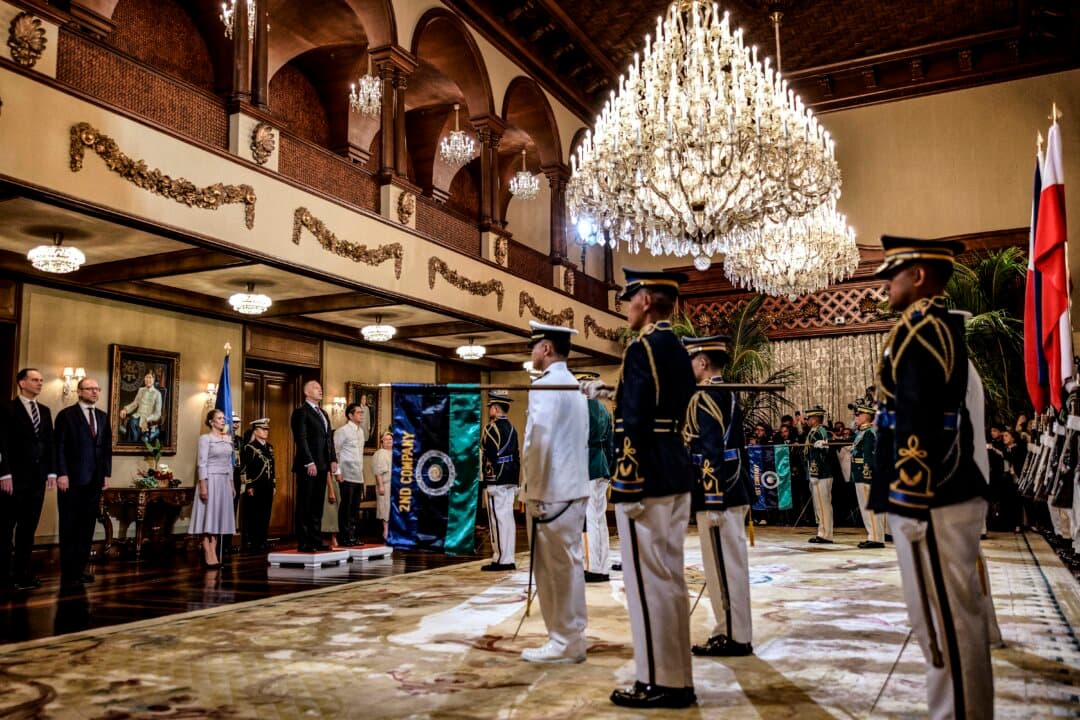Philippine President Ferdinand Marcos Jr (6th L) takes part in a welcome ceremony for Polish President Karol Nawrocki (5th L) at Malacanang Palace in Manila, Philippines, on Oct. 6, 2026. (Ezra Acayan/AFP via Getty Images)