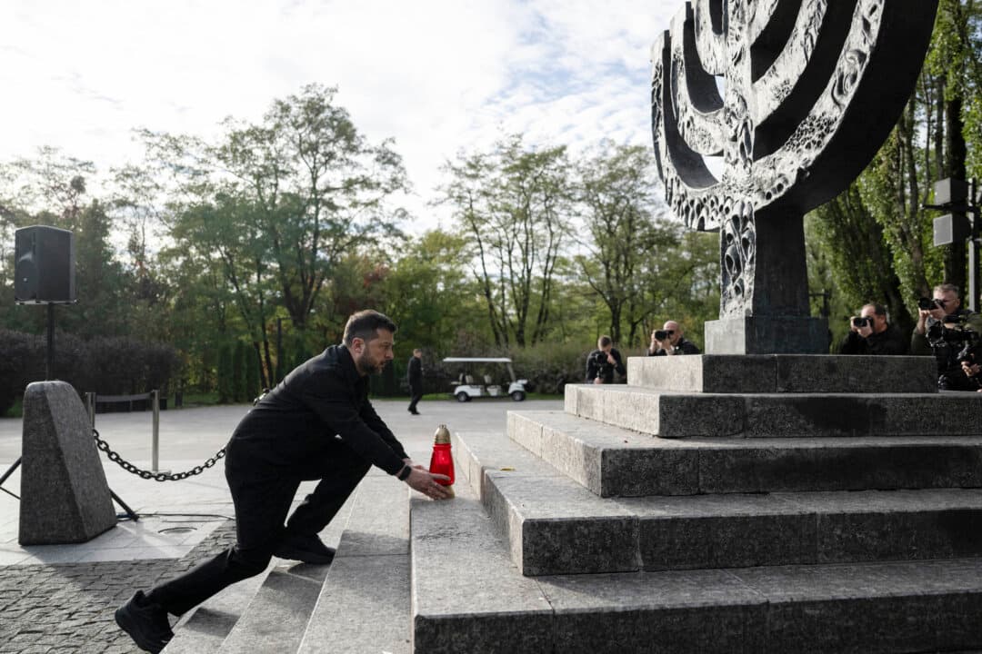 President of Ukraine Volodymyr Zelenskyy takes part in a memorial ceremony at the Babyn Yar National Historical and Memorial Reserve to honor the victims of the mass execution of civilians by the Nazis during World War II, in Kyiv, on Oct. 6, 2026. (Genya Savilov/AFP via Getty Images)