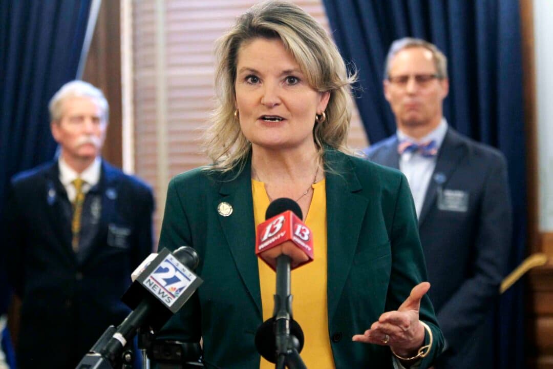 (Left) Kansas state Sen. Ty Masterson, the Republican gubernatorial candidate, speaks at the Statehouse in Topeka, Kan., on April 4, 2024. (Right) Kansas state Sen. Cindy Holscher, the Democratic gubernatorial candidate, speaks at the Statehouse in Topeka, Kan., on Jan. 12, 2023. (John Hanna/AP Photo)
