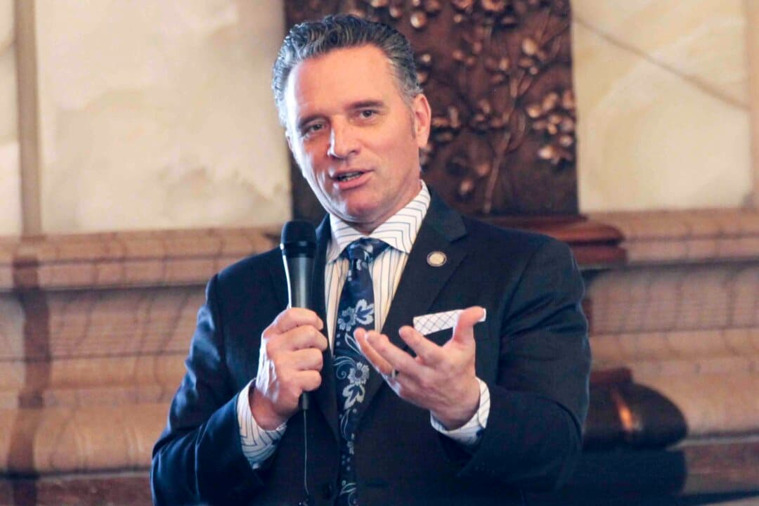 (Left) Kansas state Sen. Ty Masterson, the Republican gubernatorial candidate, speaks at the Statehouse in Topeka, Kan., on April 4, 2024. (Right) Kansas state Sen. Cindy Holscher, the Democratic gubernatorial candidate, speaks at the Statehouse in Topeka, Kan., on Jan. 12, 2023. (John Hanna/AP Photo)