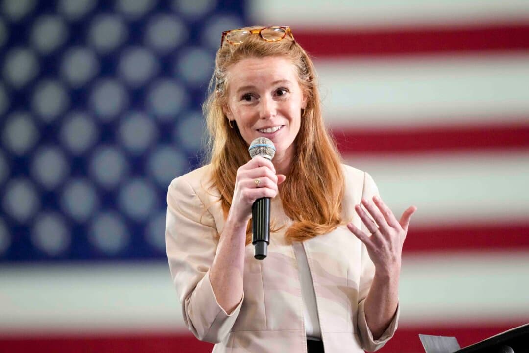 (Left) Republican Rep. Derrick Van Orden (R-Wis.) speaks in Milwaukee on July 8, 2026. (Right) Small-business owner Rebecca Cooke, Democratic candidate for Wisconsin's Third Congressional District, speaks during a town hall hosted by Pete Buttigieg in La Crosse, Wis., on Jan. 16, 2026. (Mark Schiefelbein/Pool/AFP via Getty Images, Kayla Wolf/Getty Images)