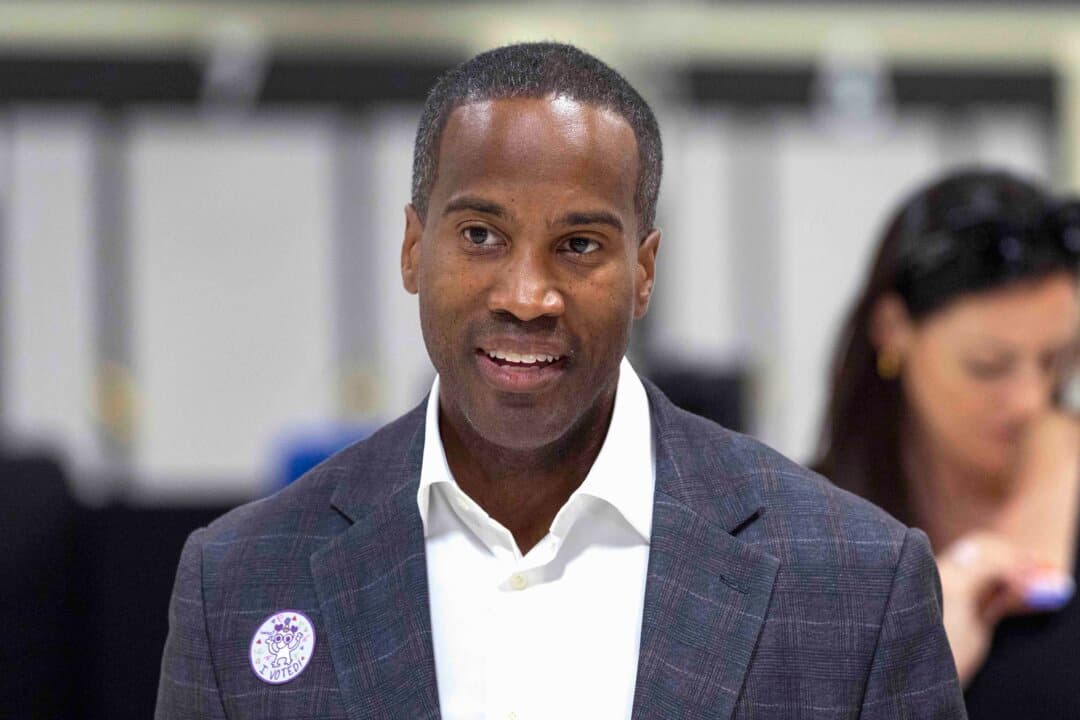 (Left) Michigan GOP gubernatorial candidate John James leaves his polling place after casting his vote in Shelby, Mich., on Aug. 4, 2026. (Right) Michigan Secretary of State Jocelyn Benson, the Democratic gubernatorial candidate, speaks in Detroit on Aug. 18, 2020. (Scott Olson/Getty Images, Rebecca Cook/Reuters)