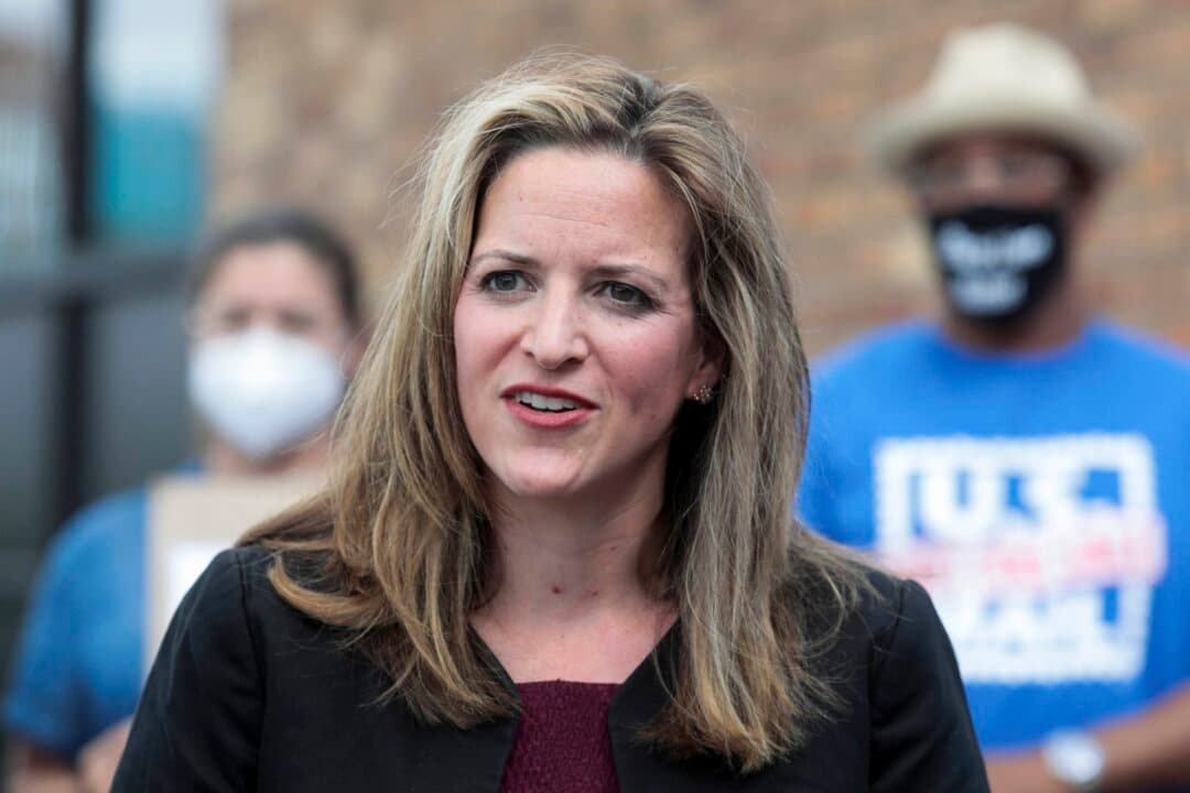 (Left) Michigan GOP gubernatorial candidate John James leaves his polling place after casting his vote in Shelby, Mich., on Aug. 4, 2026. (Right) Michigan Secretary of State Jocelyn Benson, the Democratic gubernatorial candidate, speaks in Detroit on Aug. 18, 2020. (Scott Olson/Getty Images, Rebecca Cook/Reuters)