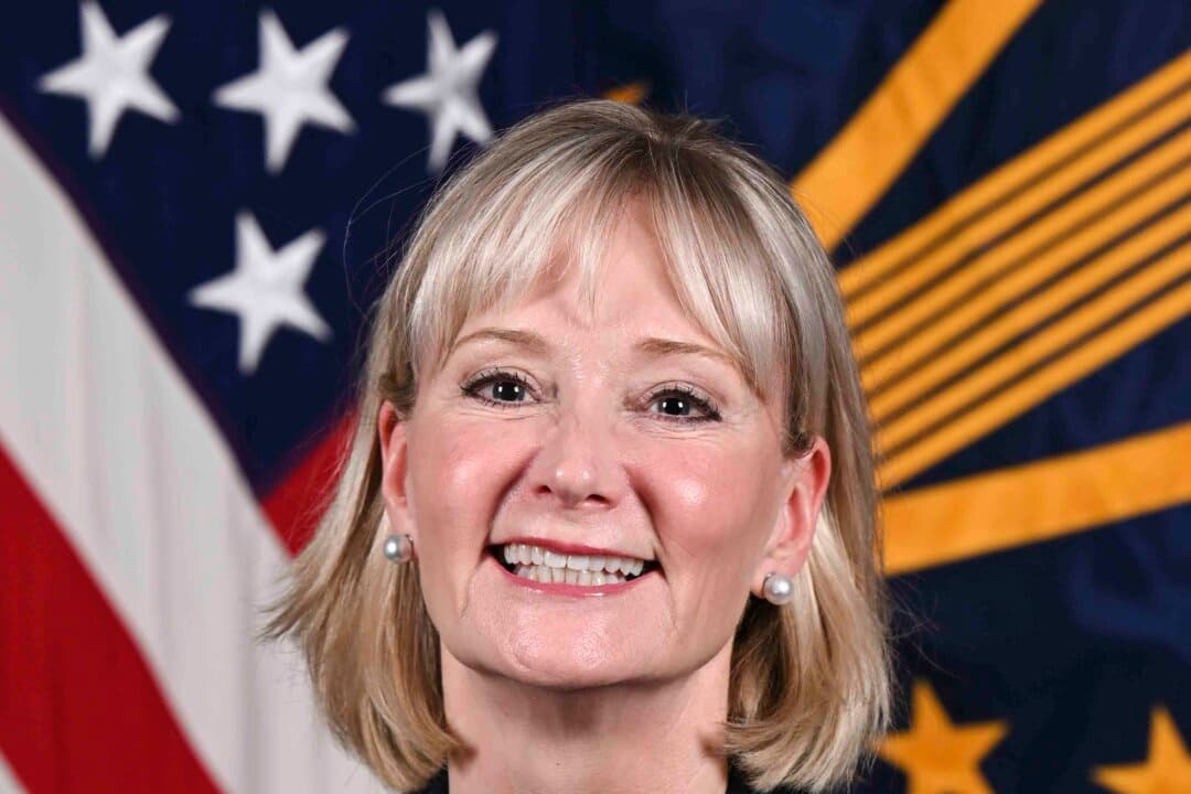 (Left) Rep. Don Davis (D-N.C.), the incumbent in the race for North Carolina's First Congressional District, in a 2022 official portrait. (Right) Ret. Army Col. Laurie Buckhout, Republican candidate for North Carolina's First Congressional District, in a 2025 official portrait. (Library of Congress, U.S. Department of Defense)