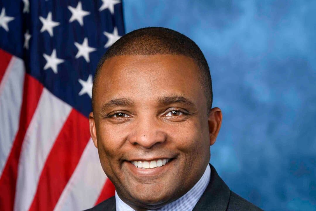 (Left) Rep. Don Davis (D-N.C.), the incumbent in the race for North Carolina's First Congressional District, in a 2022 official portrait. (Right) Ret. Army Col. Laurie Buckhout, Republican candidate for North Carolina's First Congressional District, in a 2025 official portrait. (Library of Congress, U.S. Department of Defense)