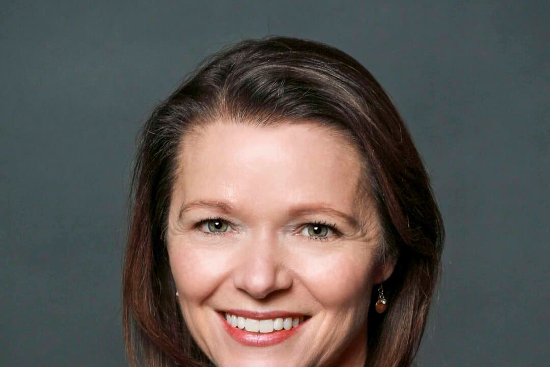 (Left) Then-Iowa state Sen. Mariannette Miller-Meeks, in an official portrait from 2019. (Right) Then-Iowa state Rep. Christina Bohannan, in an official portrait from 2021. (Iowa State Senate, Iowa General Assembly)