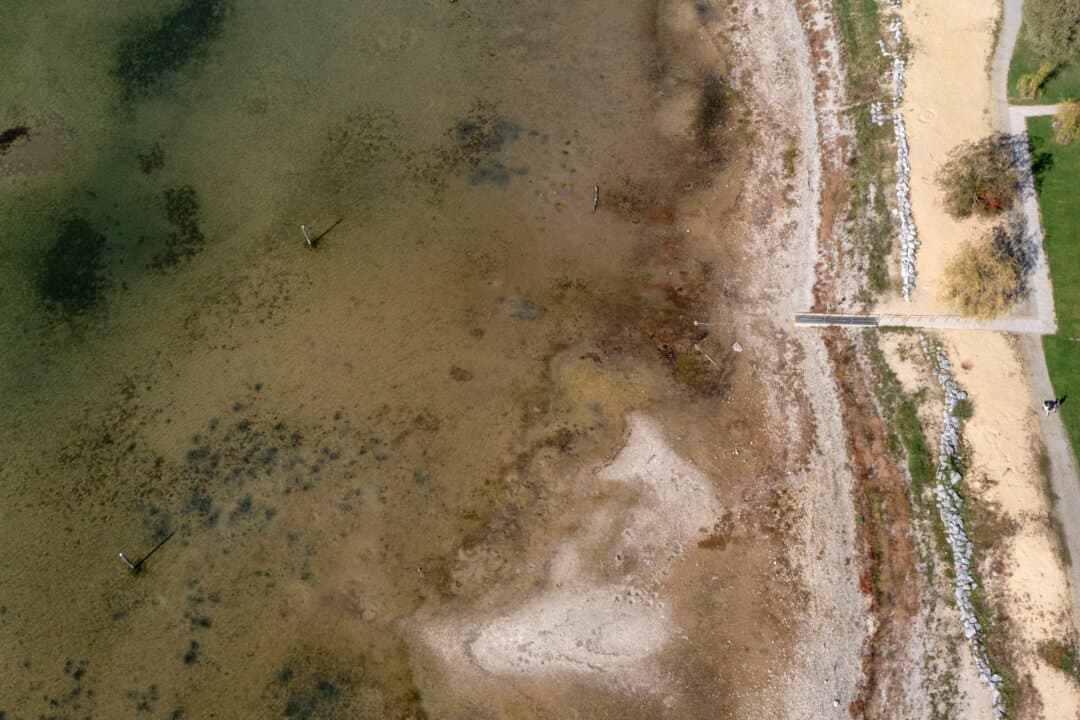 A drone image shows exposed sandbanks along the shore of Lake Constance, Germany’s largest lake, in Lindau on Oct. 7, 2026. Water levels have continued to fall following an extremely hot summer and low snowfall last winter, affecting shipping and the German economy. (Alexandra Beier/Getty Images)