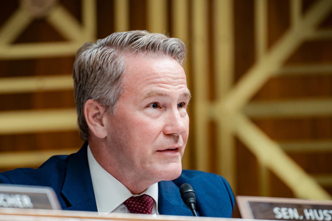 (Left) Sen. Jon Husted (R-Ohio) on Capitol Hill in Washington on July 14, 2026. (Right) Sen. Sherrod Brown (D-Ohio) speaks during a Senate Banking Committee hearing on Capitol Hill in Washington on April 27, 2023. (Madalina Kilroy/The Epoch Times, Drew Angerer/Getty Images)